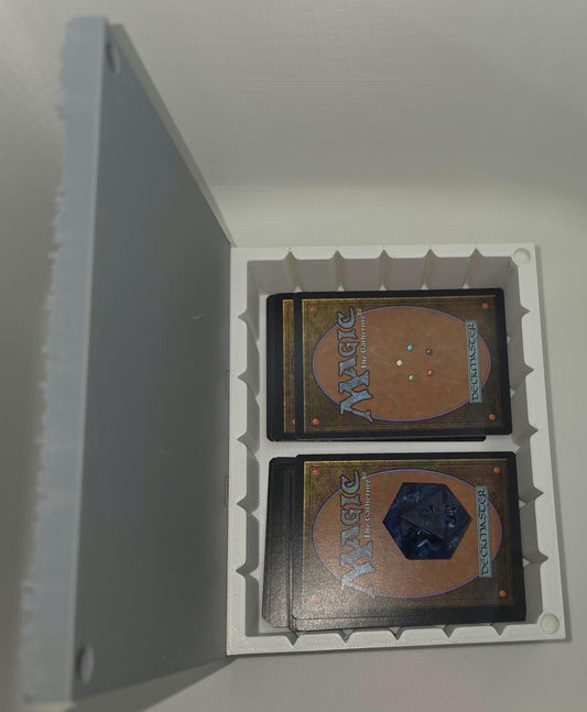 Two trading cards from 'Magic: The Gathering' in a protective holder against a white background | background_removed | watermarked